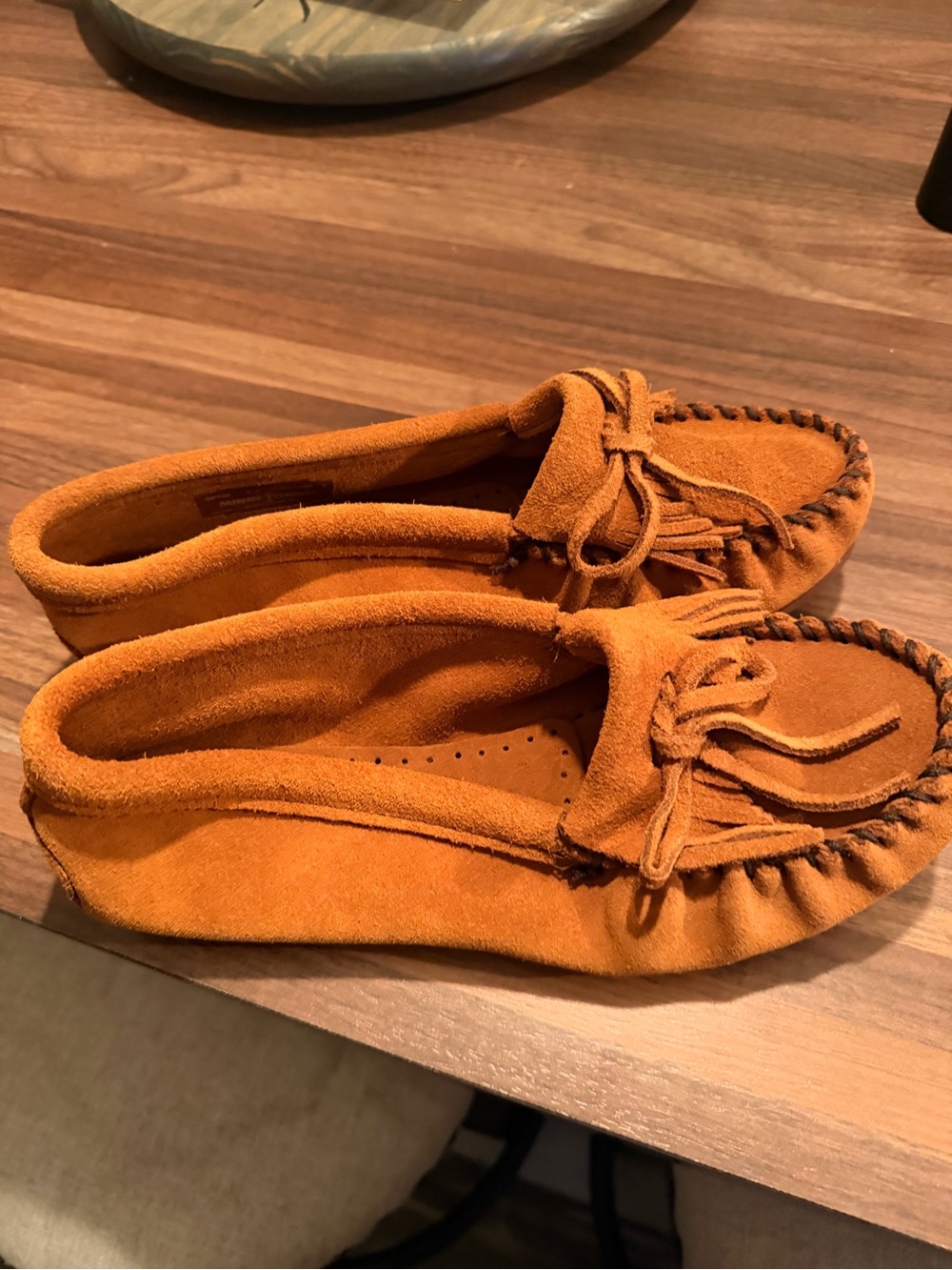 Minnetonka Suede Moccasins in Orange with Bow